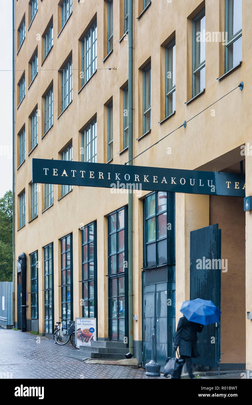 Woman entering Helsinki Theatre Academy Stock Photo Alamy