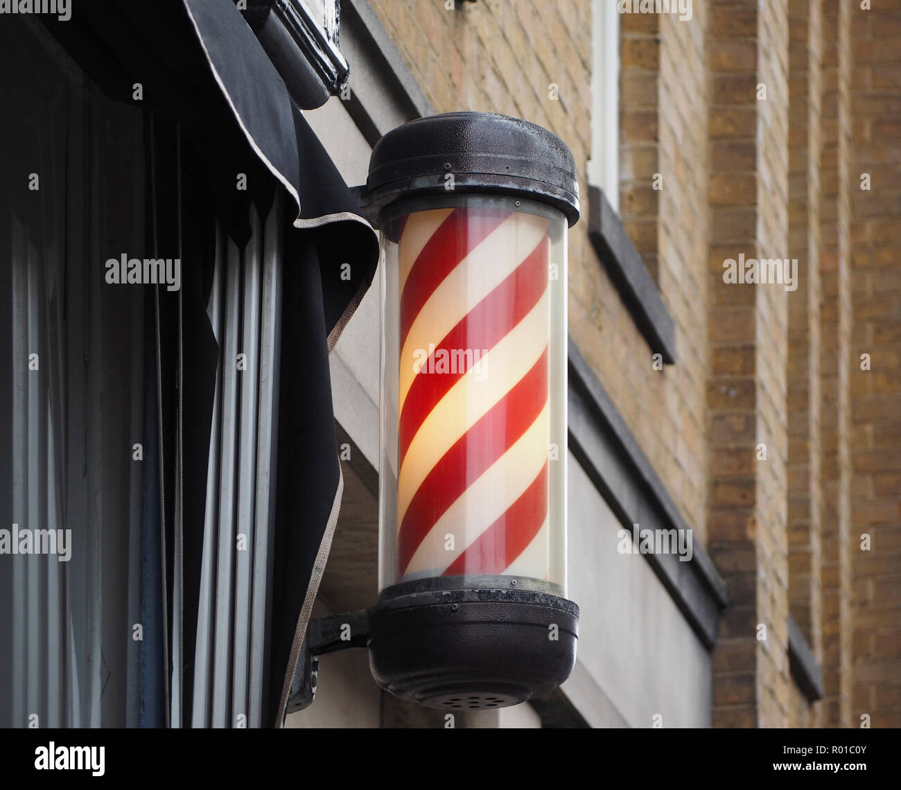 barber's pole sign with red and white stripes Stock Photo Alamy