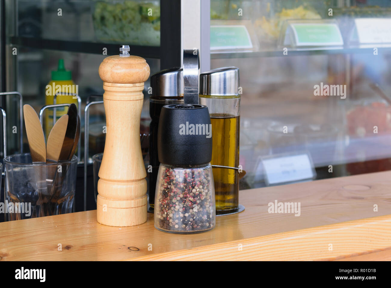 Spices on the counter of a restaurant Stock Photo