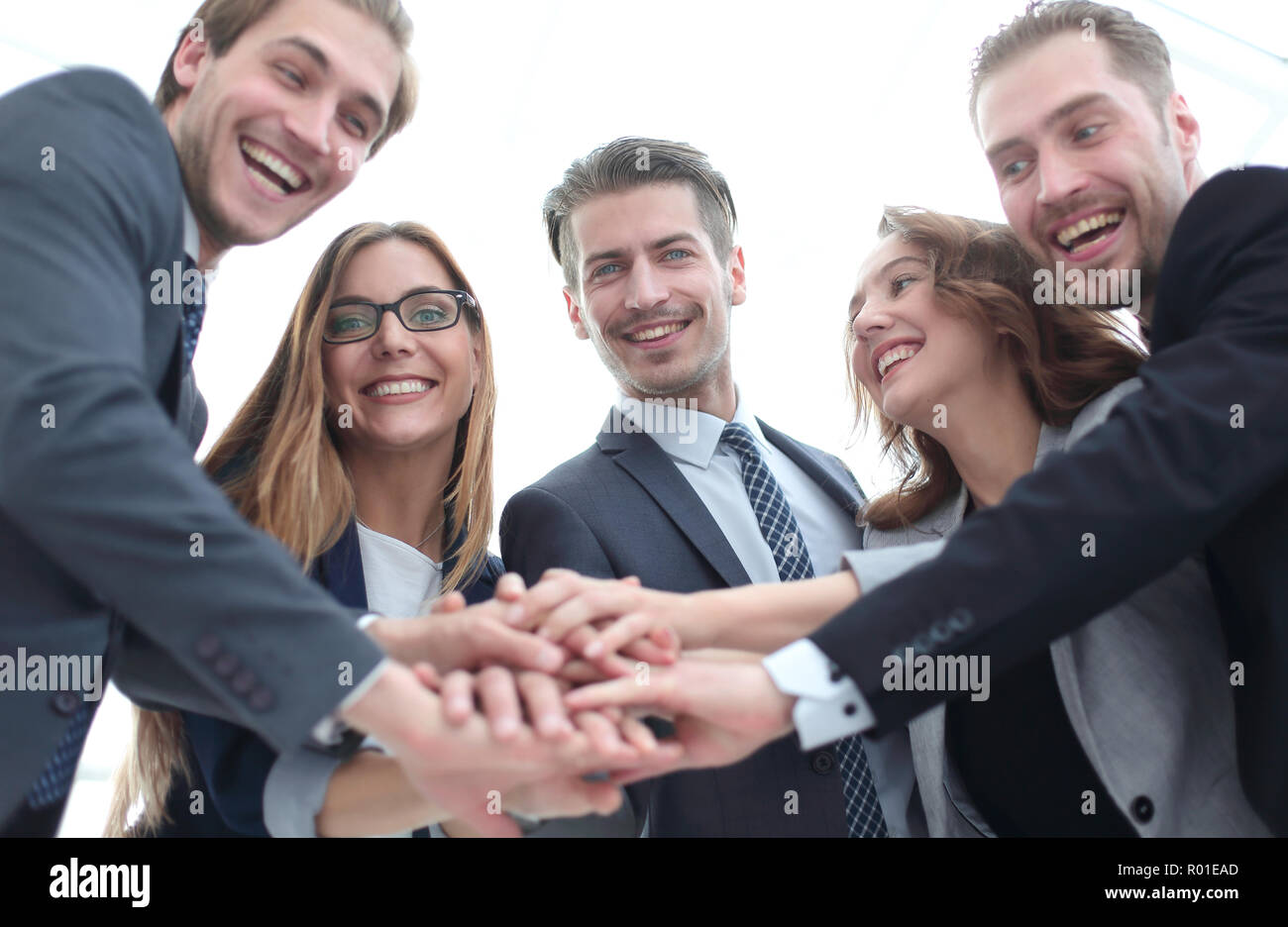 happy business team celebrating victory in office Stock Photo - Alamy