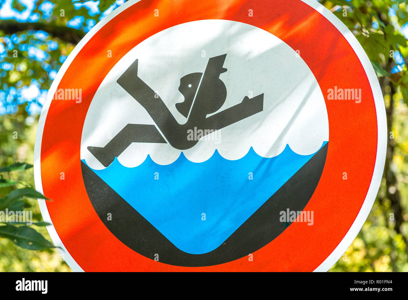 Warning sign not to fall into the dirtwater,  Wallgau, Bayern, Deutschland Stock Photo