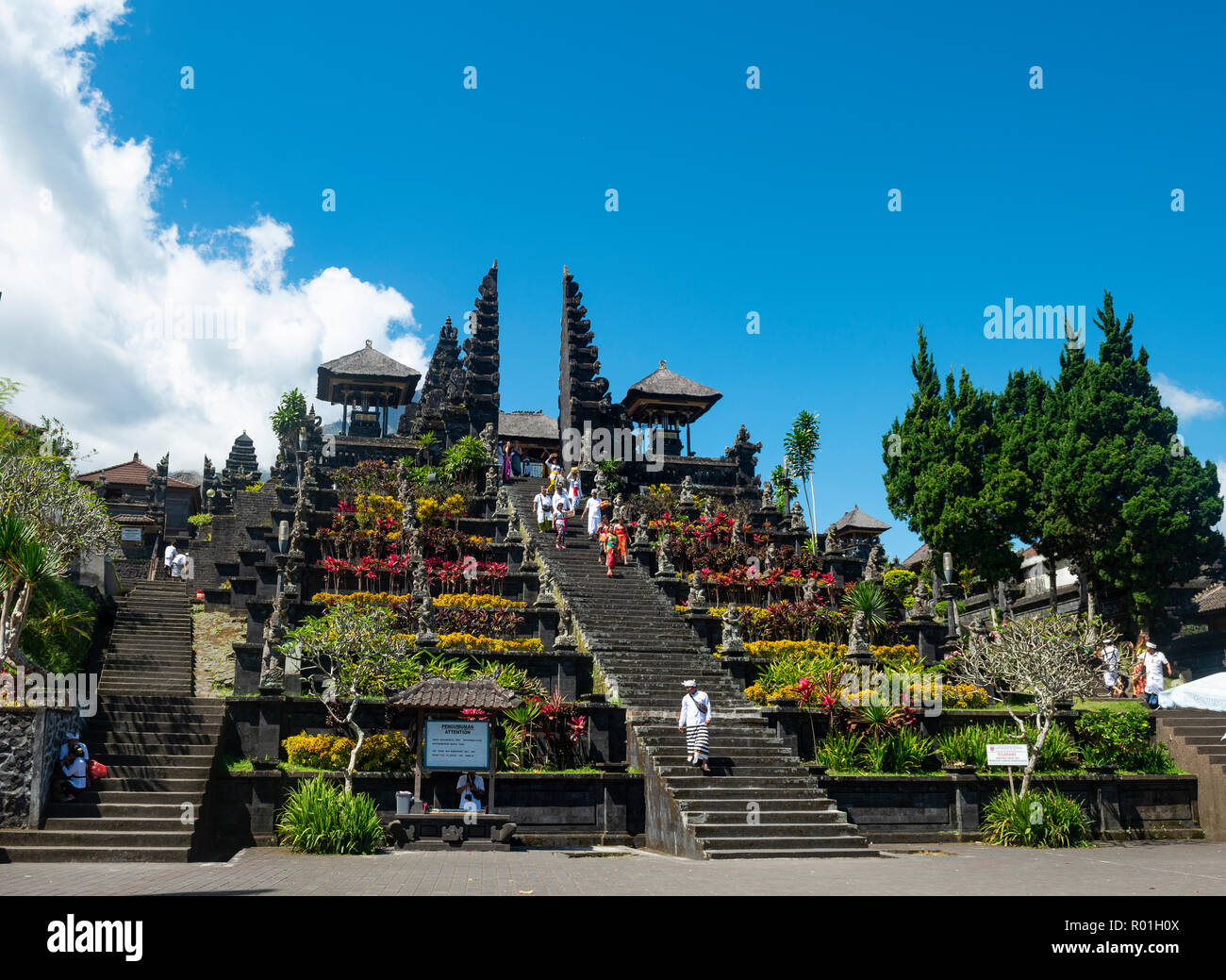 Devout Balinese descend stairs, split gate, Candi bentar, mother temple Besakih, Pura Agung Besakih Penetaran, Banjar Besakih Stock Photo