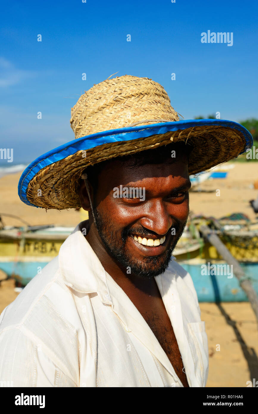 Fisherman at the beach of Tangalle, Sri Lanka Stock Photo