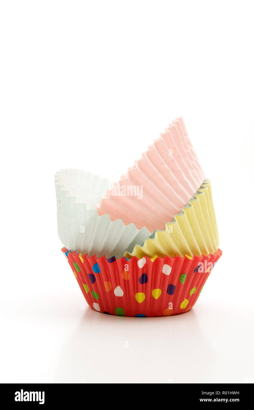 Stacked Multi-Colored Muffin Baking Cups on White Background Stock Photo