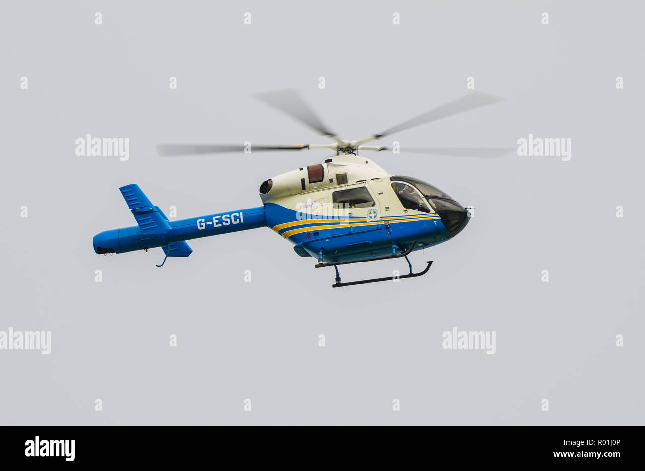 Medical Aviation Services MD900 Explorer G-ESCI air ambulance in flight. Flying medical team Stock Photo