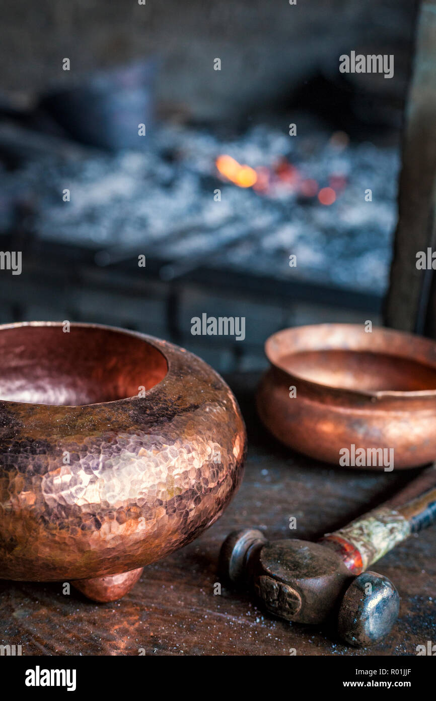 Hammered copper pots sit near the hearth in Santa Clara del Cobre