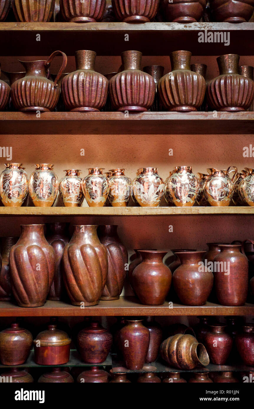 Copper pots decorated with silver stand out on a Santa Clara del Cobre