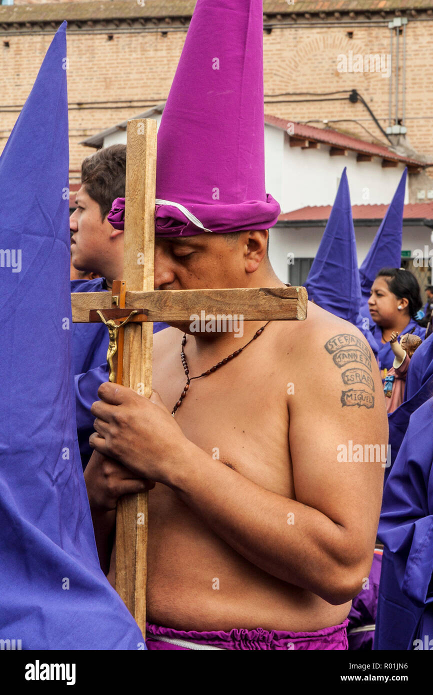Quito, Ecuador - April 22, 2011: Close up of unidentified man getting ready for religious procesion Stock Photo