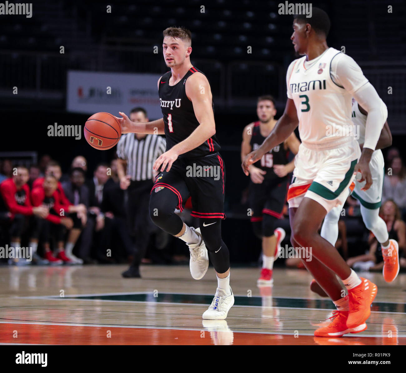 Coral Gables, Florida, USA. 30th Oct, 2018. Barry Buccaneers guard/forward  Evan Walshe (1) in action during the NCAA men's basketball exhibition game  between the Barry Buccaneers and the Miami Hurricanes at the