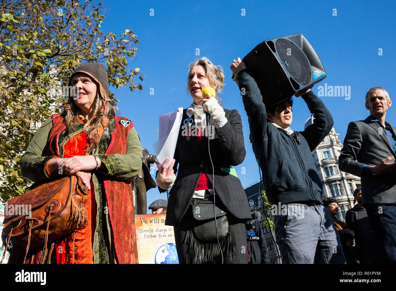 London, UK. 31st October, 2018. Dr Gail Bradbrook, scientist and activist, addresses environmental campaigners gathered in Parliament Square make a formal declaration of non-violent rebellion against the British government for 'criminal inaction in the face of climate change catastrophe and ecological collapse'. Credit: Mark Kerrison/Alamy Live News Stock Photo