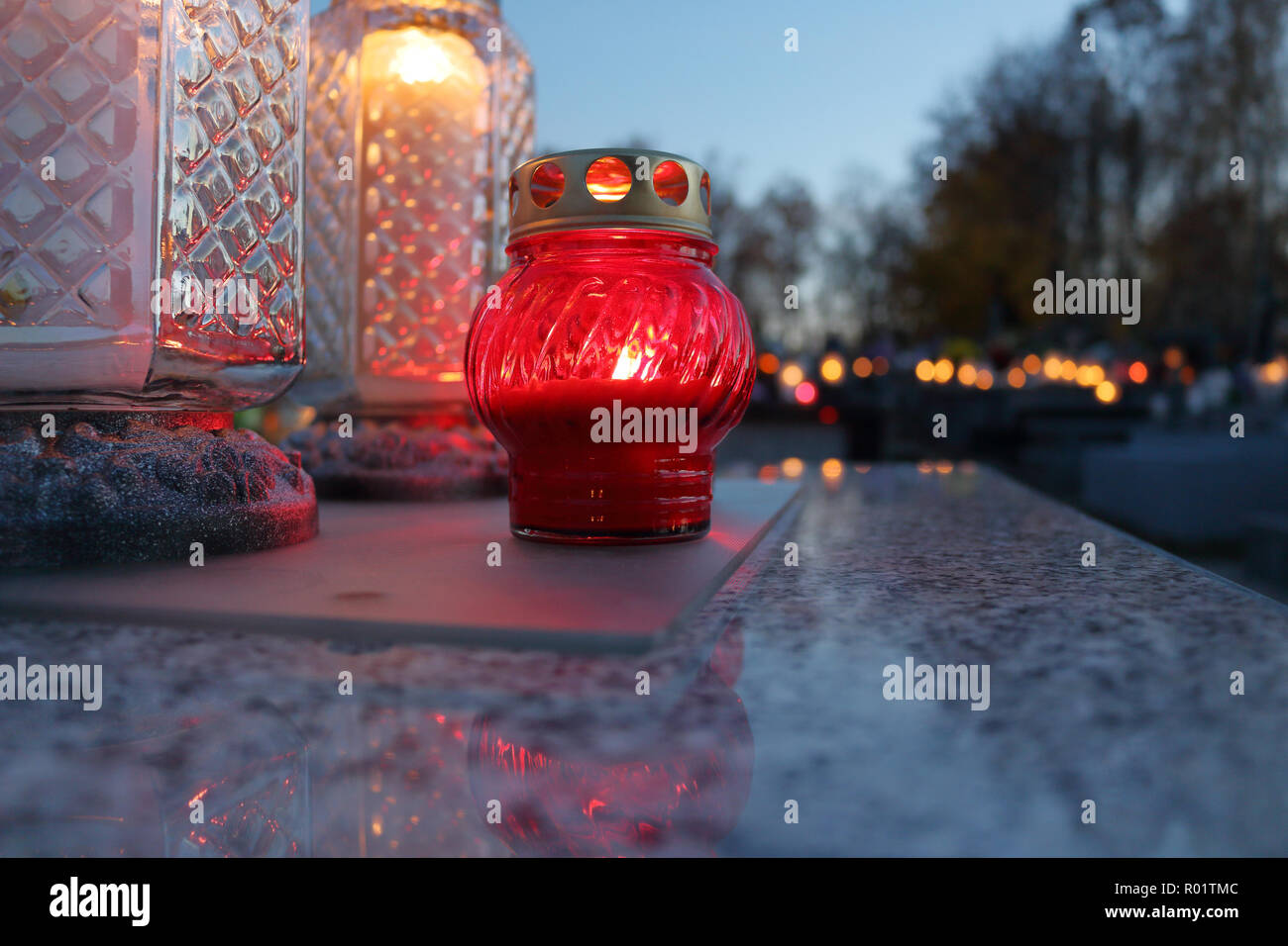 ZACHELMIE, POLAND - OCTOBER 31, 2018: Candles laid on graves in cemetery on the eve of All Saints' Day. Credit: Slawomir Wojcik/Alamy Live News Stock Photo