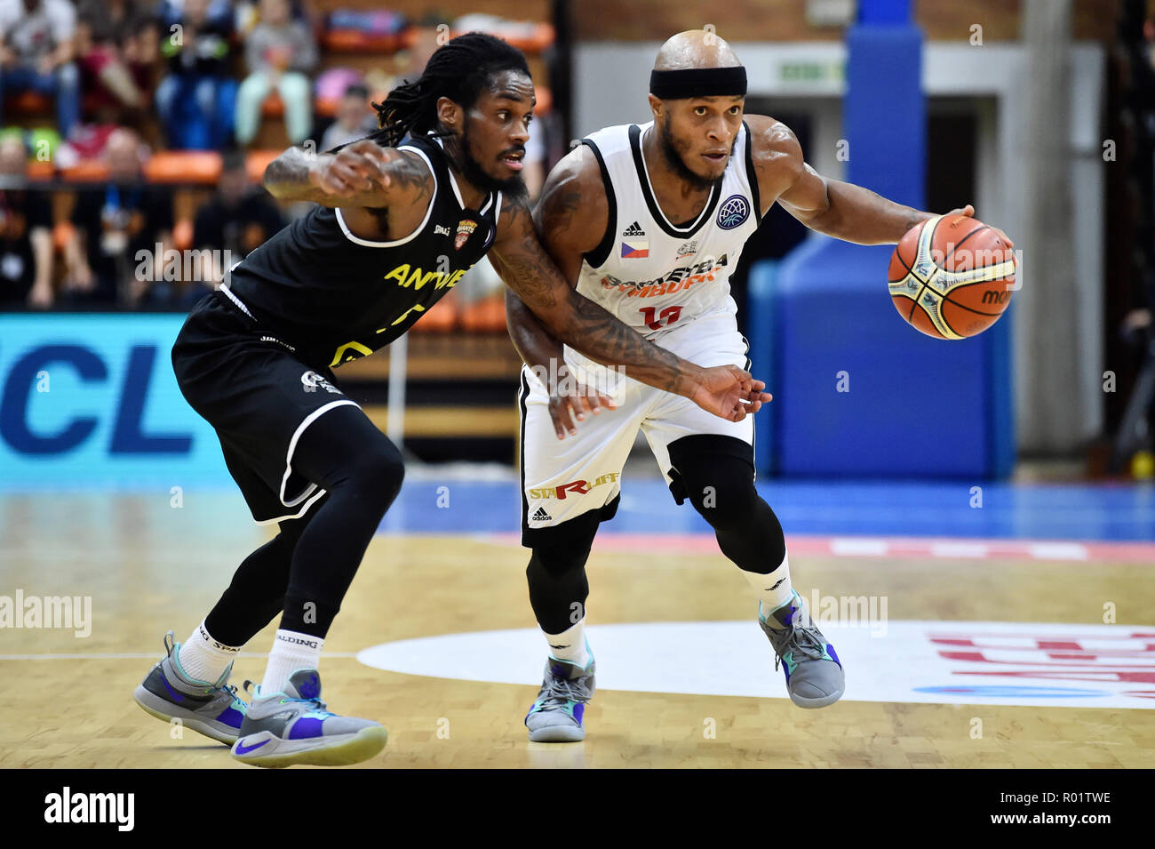 Nymburk, Czech Republic. 31st Oct, 2018. L-R Paris Lee of Antwerp and Eugene Lawence of Nymburk in action in the 4th round men's basketball Champions League match Nymburk vs Antwerp, in Nymburk, Czech Republic, October 31, 2018. Credit: Josef Vostarek/CTK Photo/Alamy Live News Stock Photo