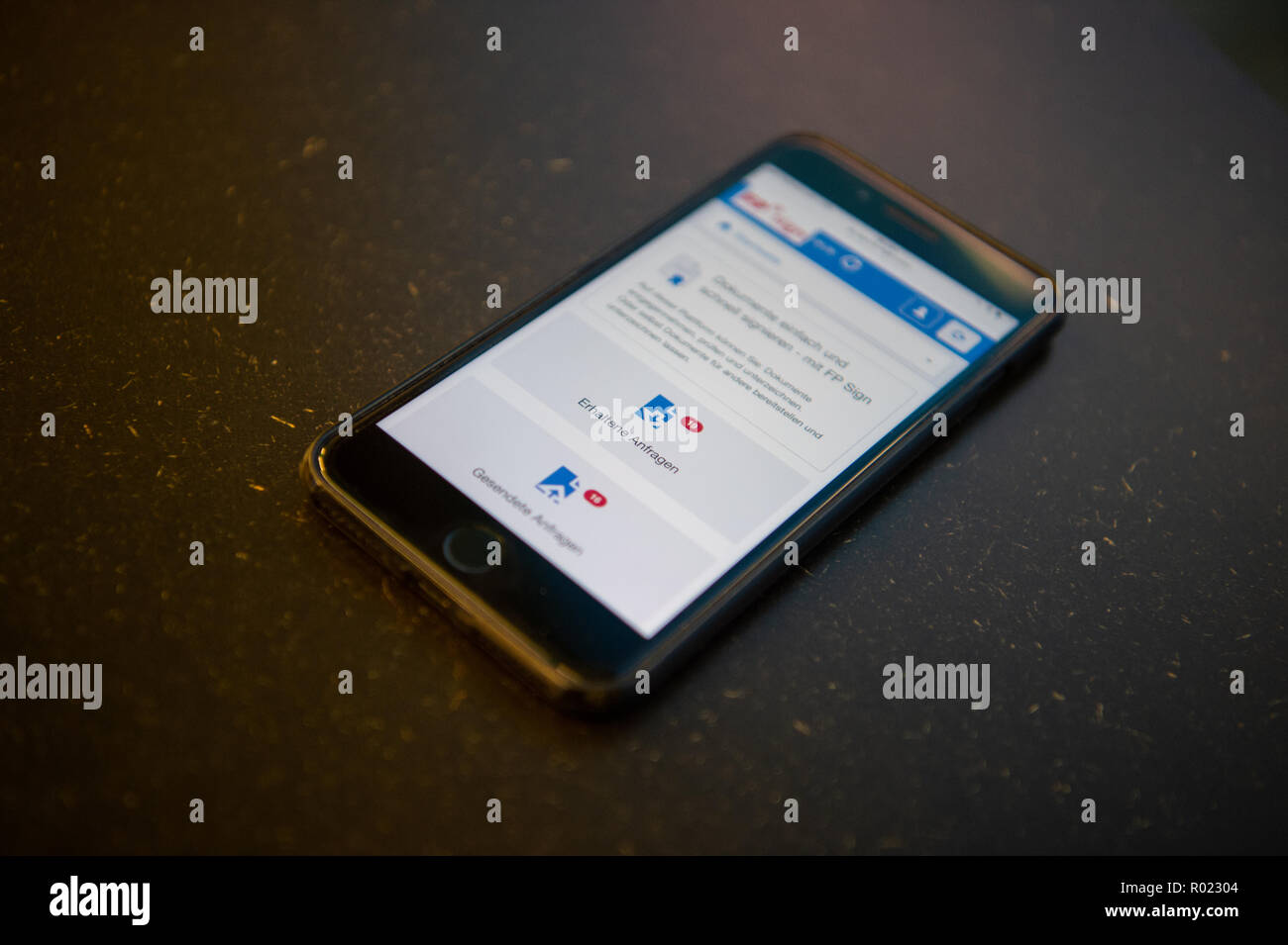 Berlin, Germany. 30th Oct, 2018. A mobile phone showing the browser start page of the signature solution FP Sign is lying on a table. FP Sign is a digital application designed to sign documents as securely as possible. Companies and business people can sign and exchange contracts and important documents in a short time. The identity of the sender can also be verified by a certificate from Bundesdruckerei. Credit: Arne Immanuel Bänsch/dpa/Alamy Live News Stock Photo