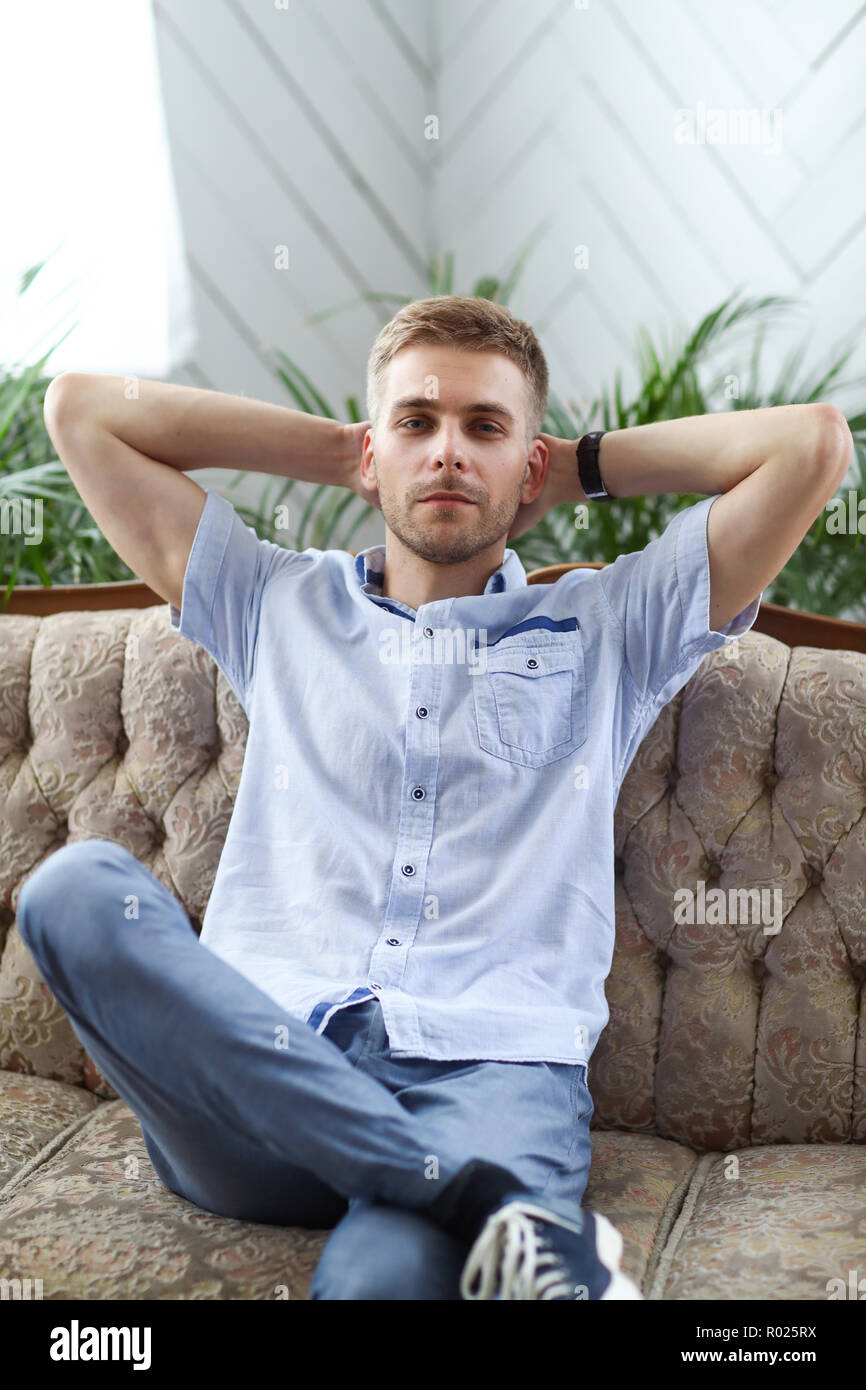 Handsome man in a blue shirt Stock Photo