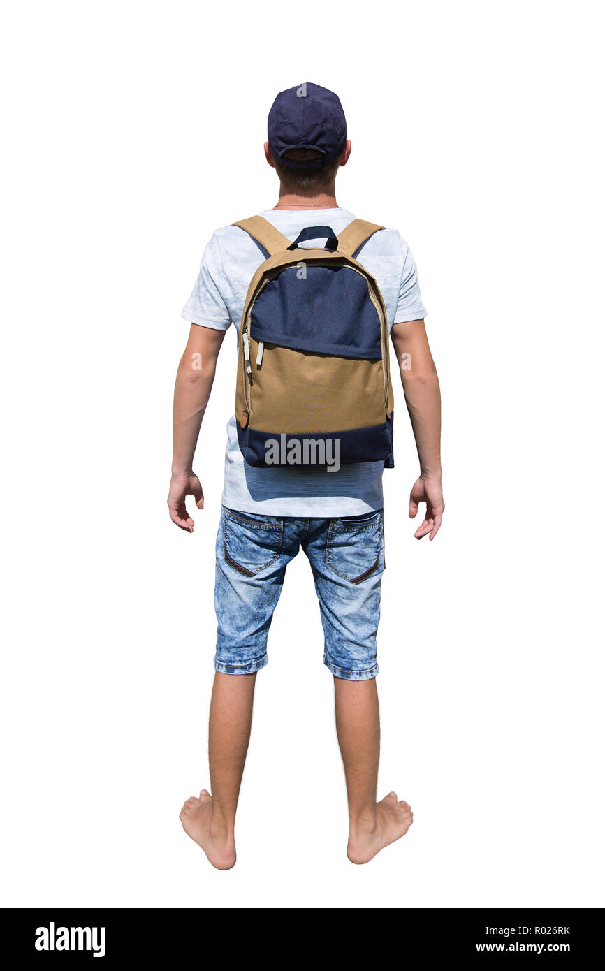 Rear view full length portrait of a curious young man traveler carrying a backpack and wearing a cap ready for adventure isolated over white backgroun Stock Photo