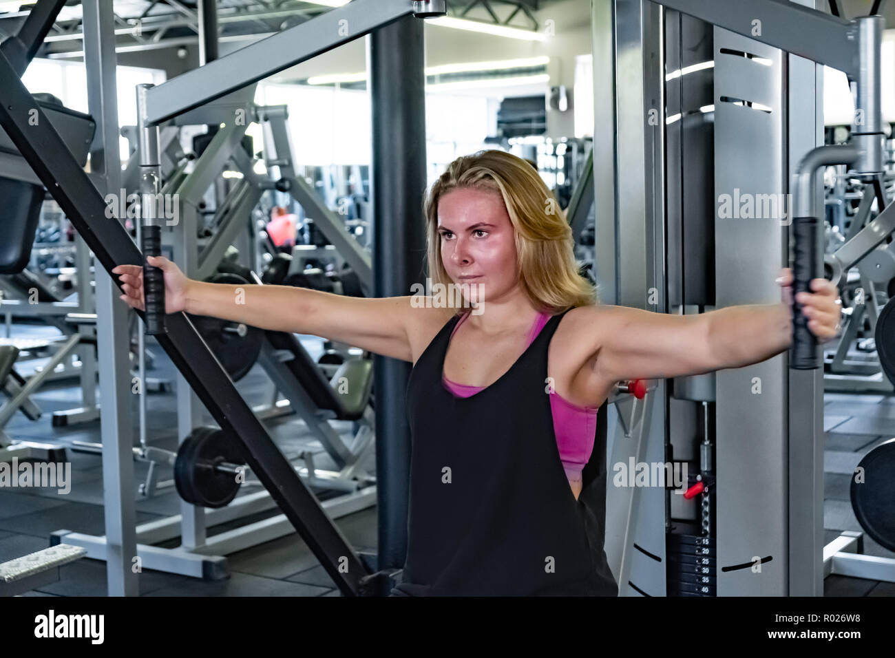 Chest press machine hi-res stock photography and images - Alamy