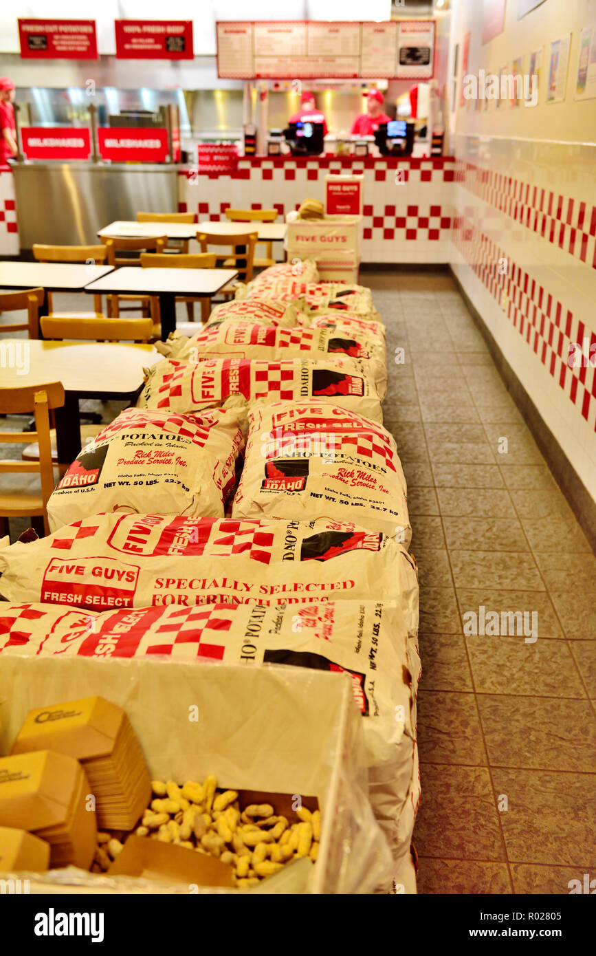 Inside Five Guys fastfood chain serving burgers, fresh fries branch in Ithaca NY, USA with