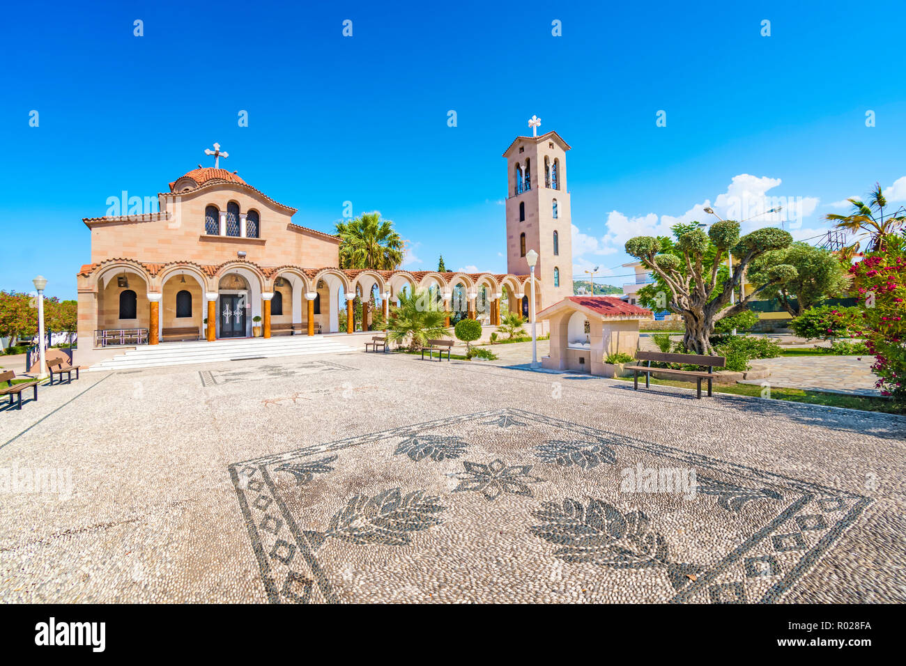 Orthodox church of Saint Nektarios with bell tower in Faliraki (Rhodes, Greece) Stock Photo