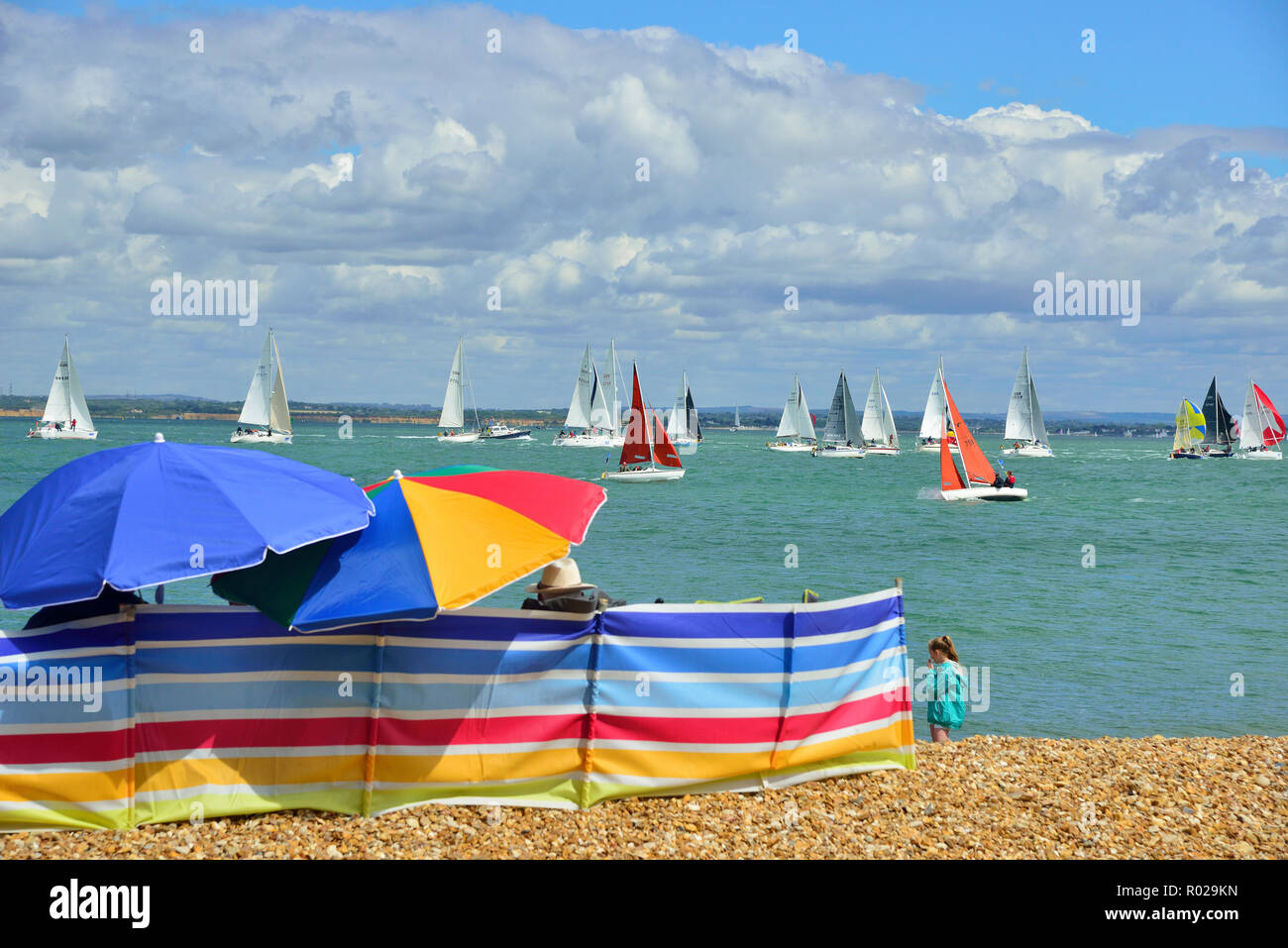 Spectators watch the yacht racing in the Solent during Lendy Cowes Week (2018), Cowes, Isle of Wight, UK Stock Photo