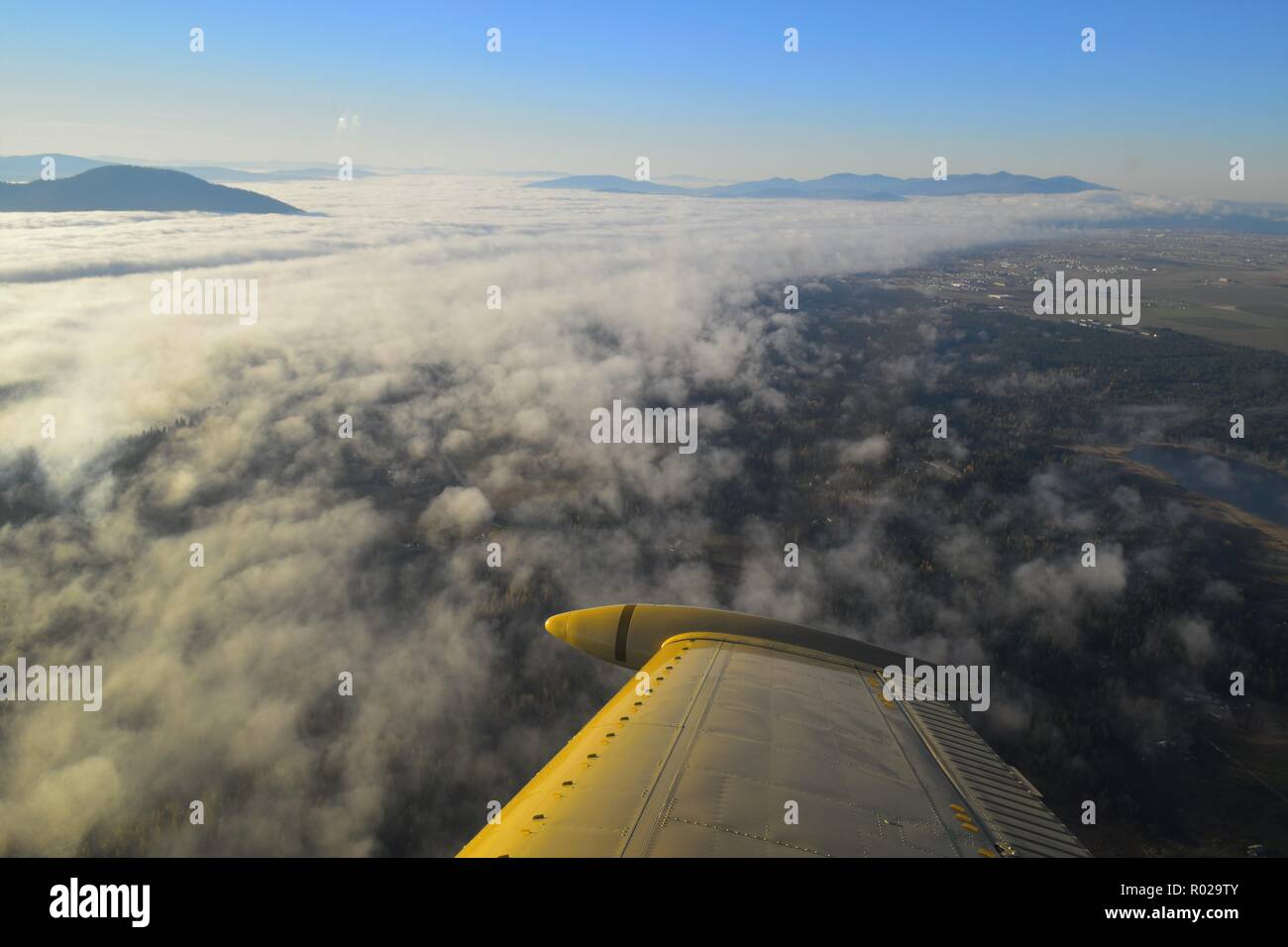 flying a plane above the clouds Stock Photo - Alamy