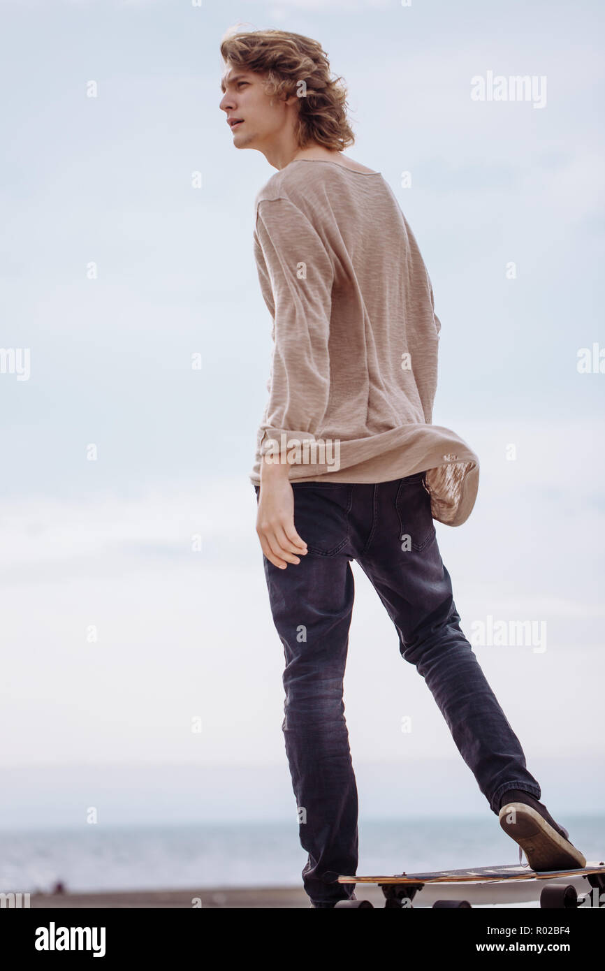 Foot Riding Away Boy posing skate board hi-res stock photography and images - Alamy