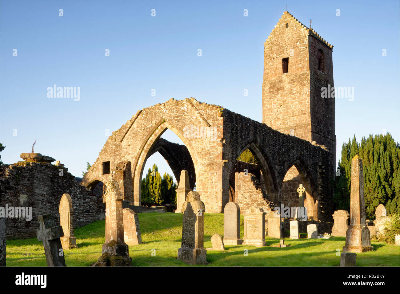 Early Morning Sun on 12th century Muthill Tower and remains of Church walls  Perth & Kinross, Scotland Stock Photo