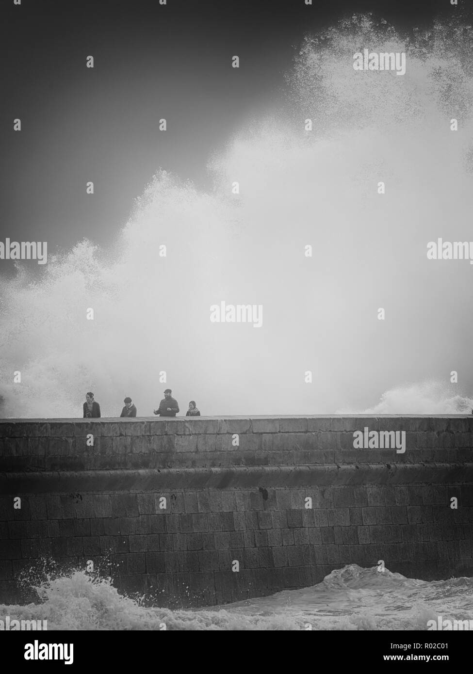 Porto, Portugal February 7, 2016 People crossing the dangerous river