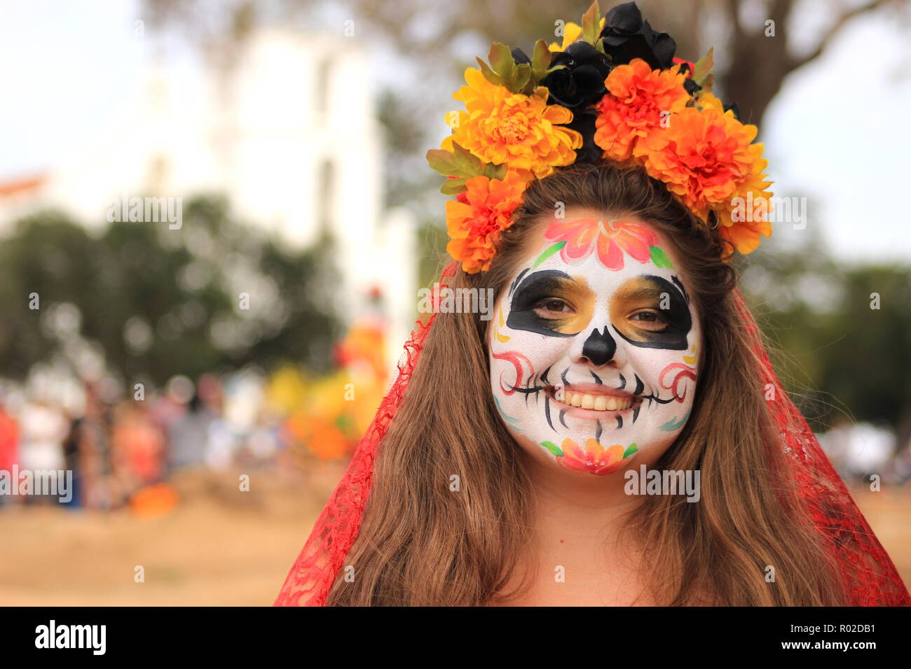 Woman with beautiful sugar skull makeup (Catrina) during Day of the Dead celebration (Dia de los Muertos) Stock Photo