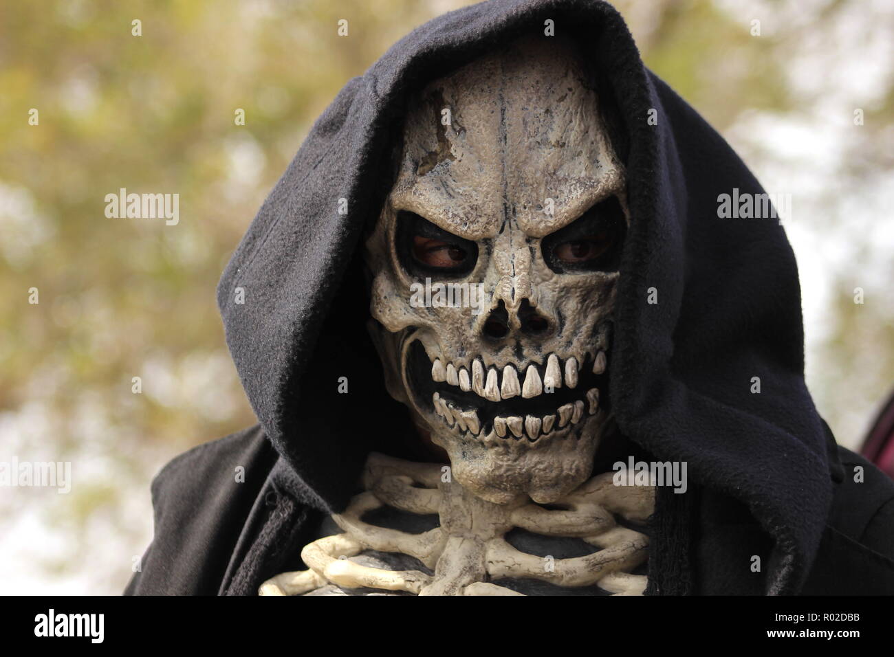 Scary closeup of a Grim Reaper face Stock Photo