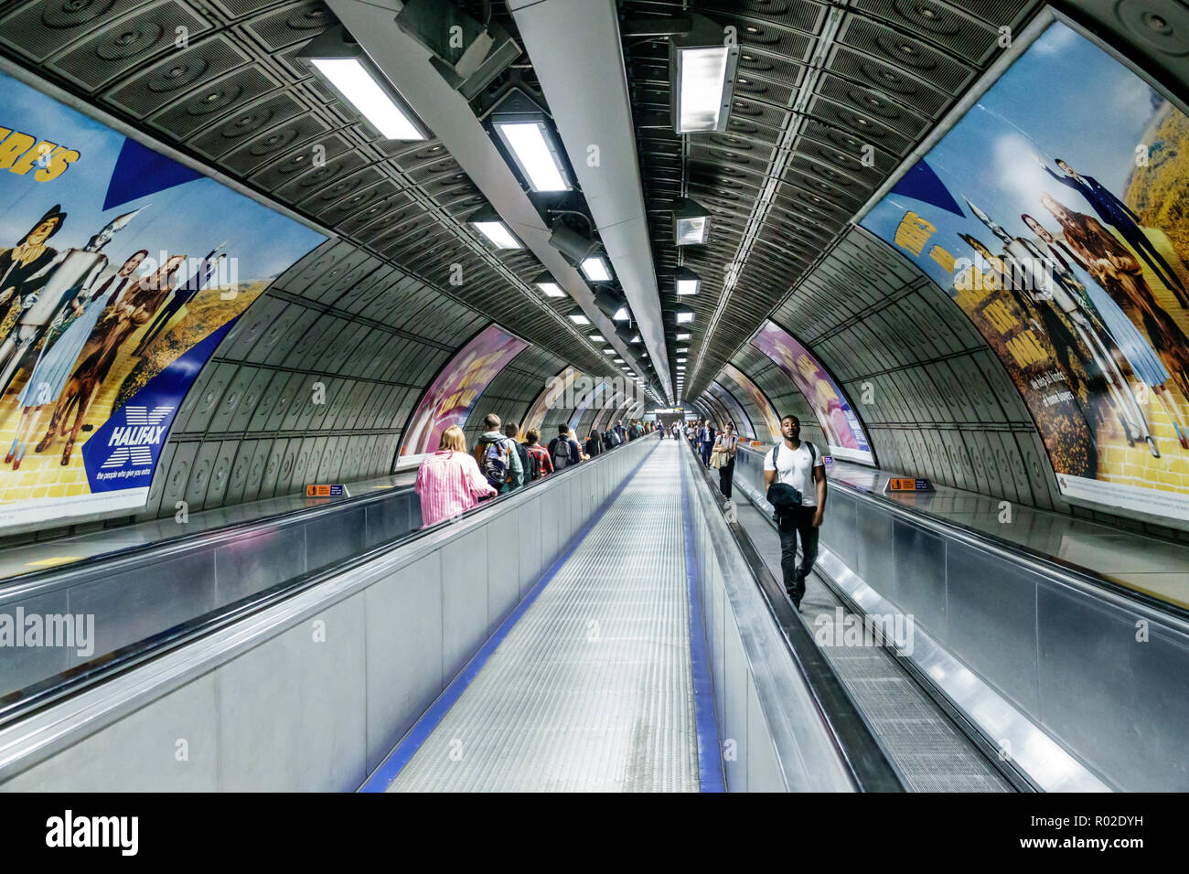 London England,UK,Lambeth South Bank,Waterloo Underground Station train Tube,underground subway tube,moving sidewalk,travellator,tunnel,Black man men Stock Photo