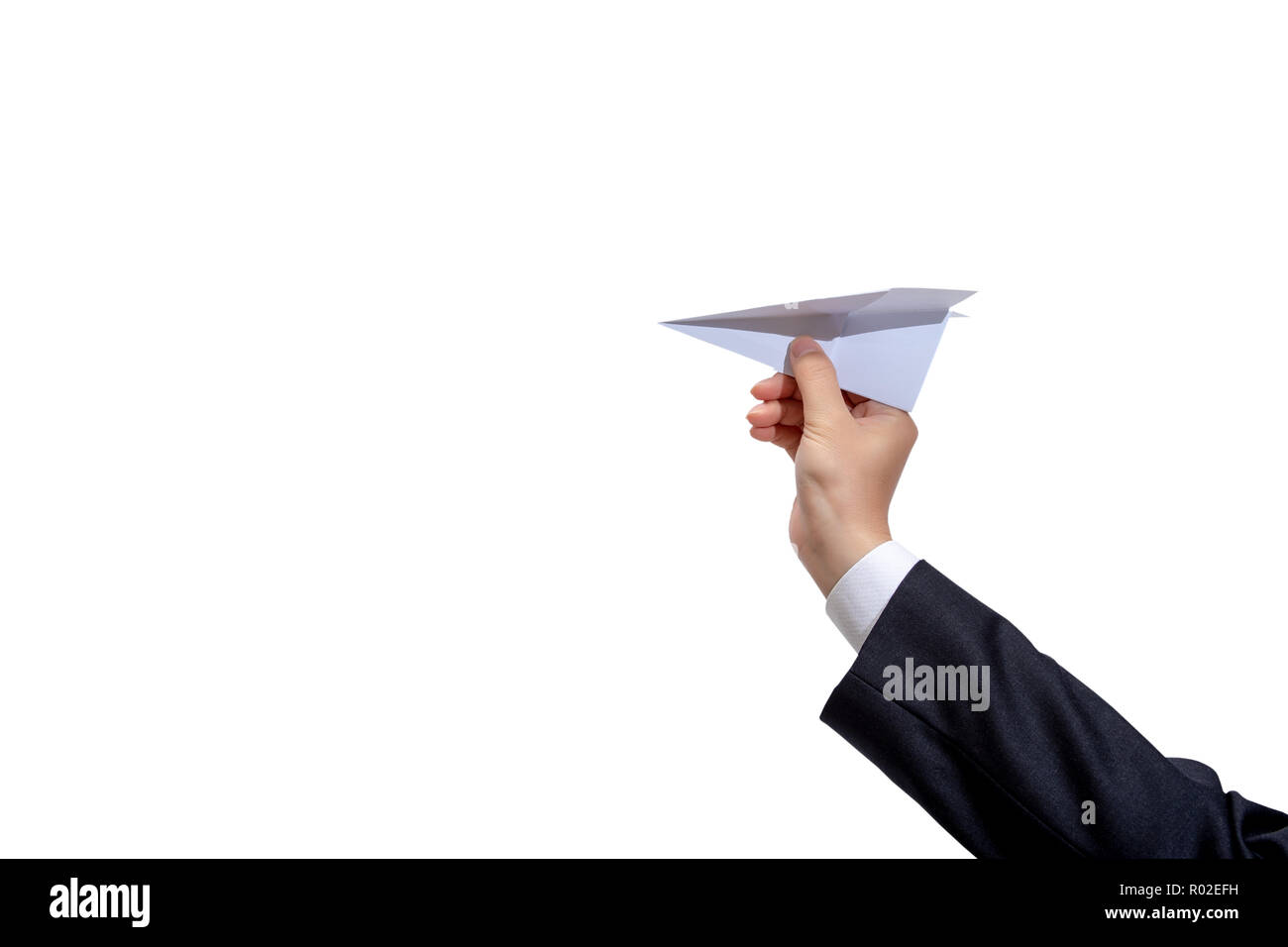 Businessman hand holding paper plane on white background . Stock Photo