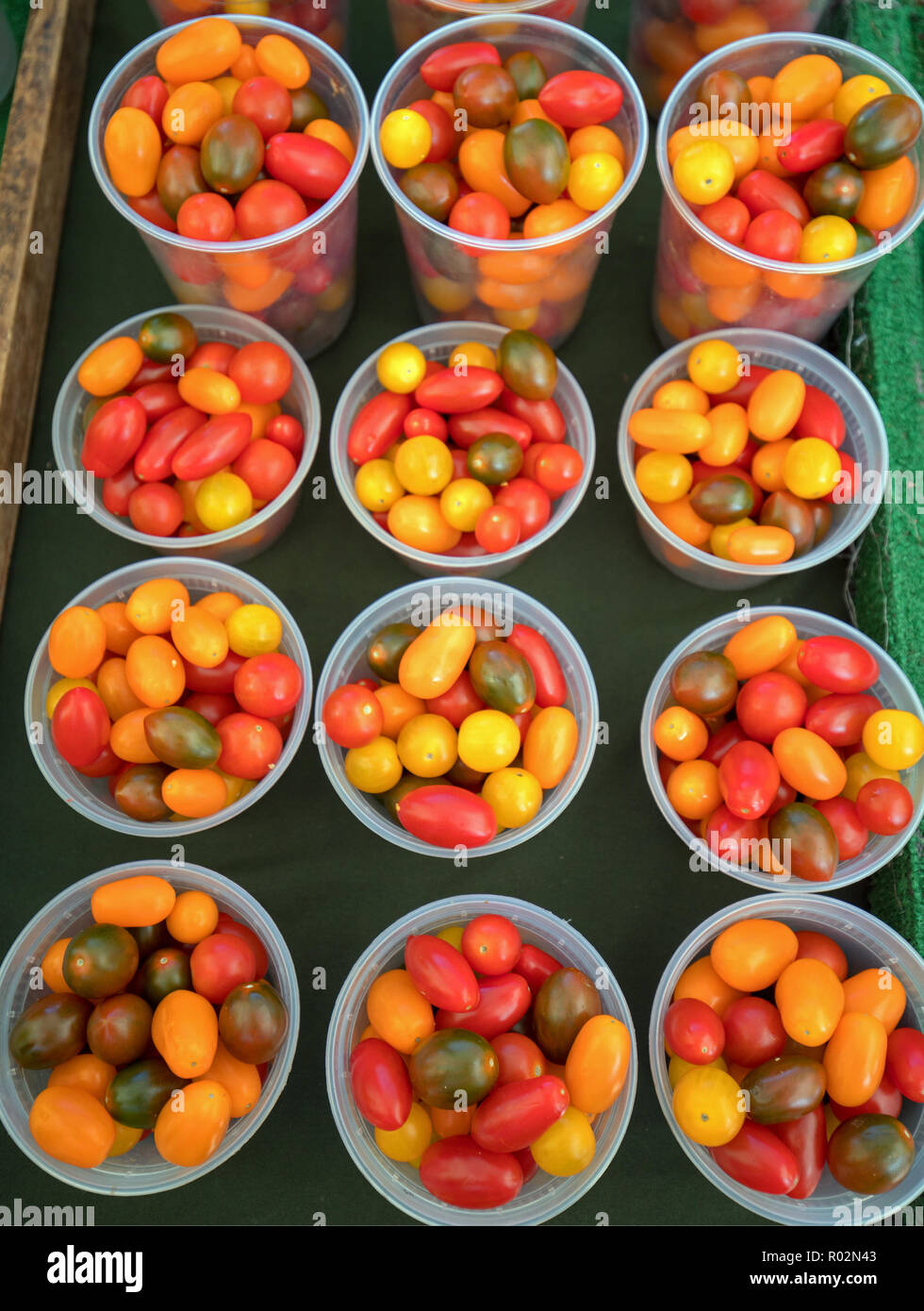 Heirloom Cherry Tomatoes at farmers market in California Stock Photo