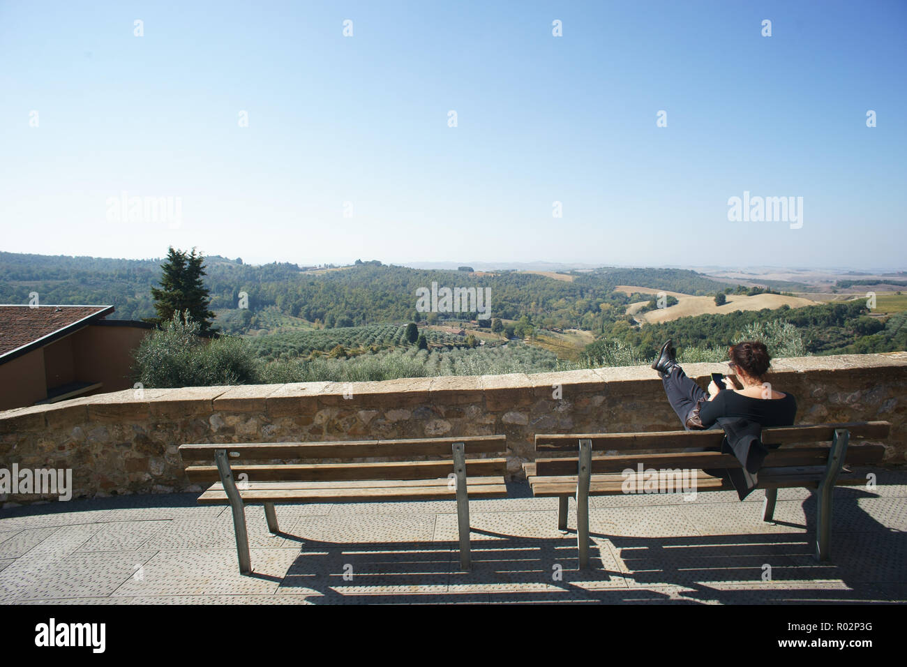 Woman relaxing in Trequanda, province of Siena, Tuscany, Italy Stock Photo