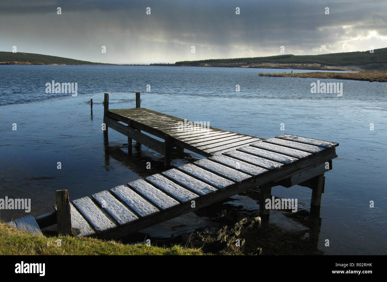 Frost covered boat pontoon Loch Mannock, near Laurieston, Dumfries and