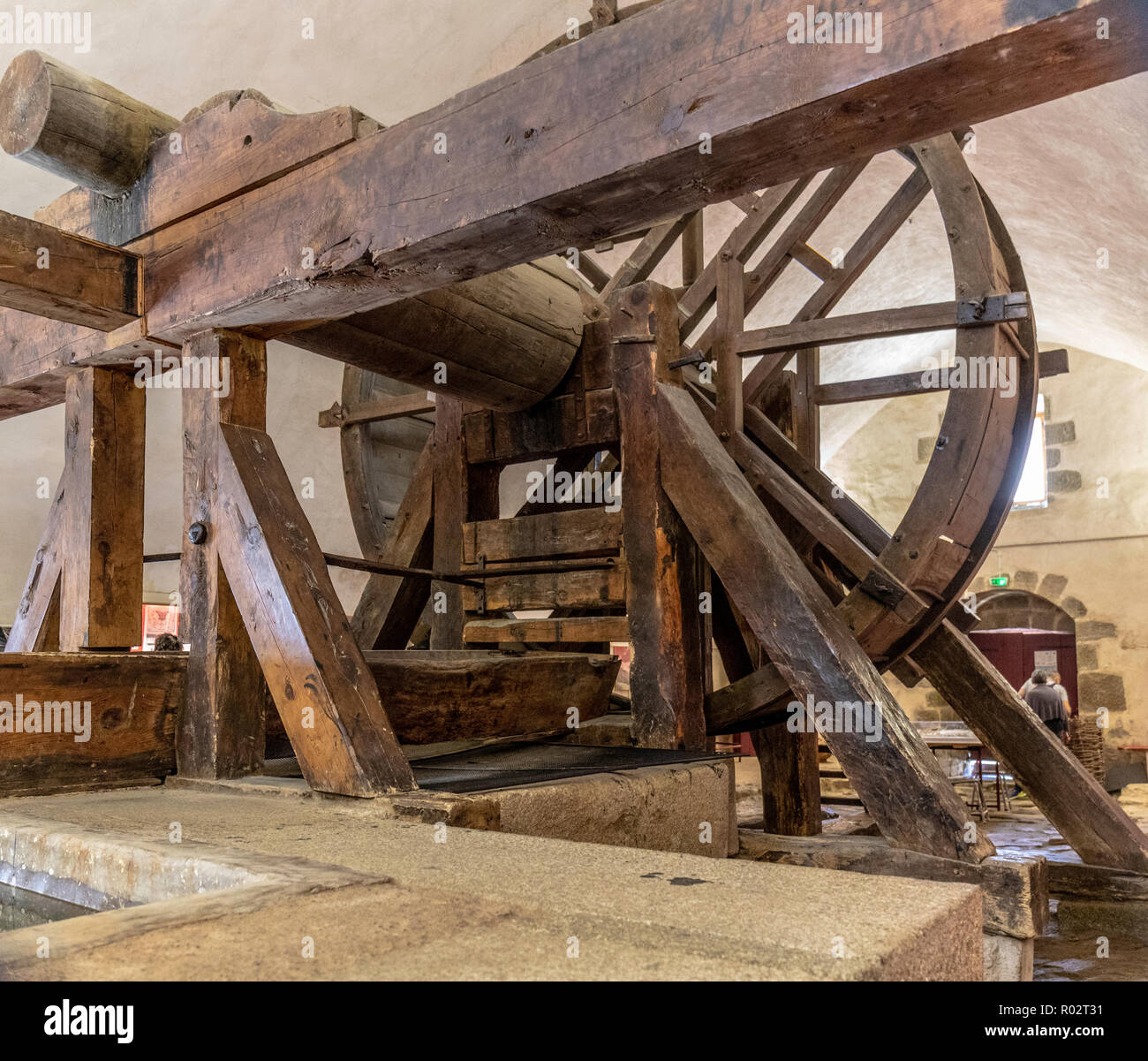 The tread mill used to draw water up from a deep well and also used to discipline misbehaving army recruits Stock Photo