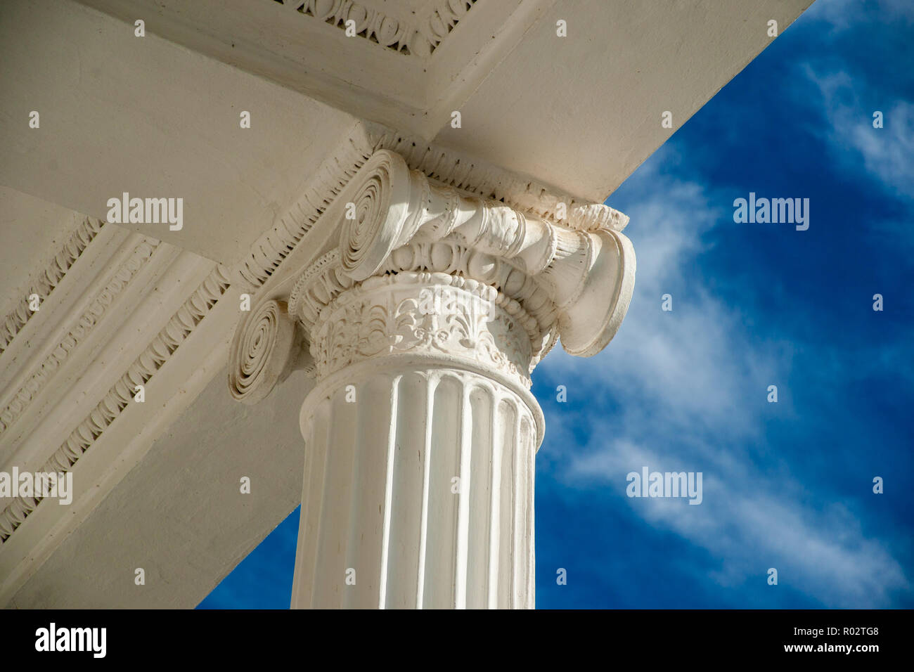 Columns on blue sky background Stock Photo - Alamy