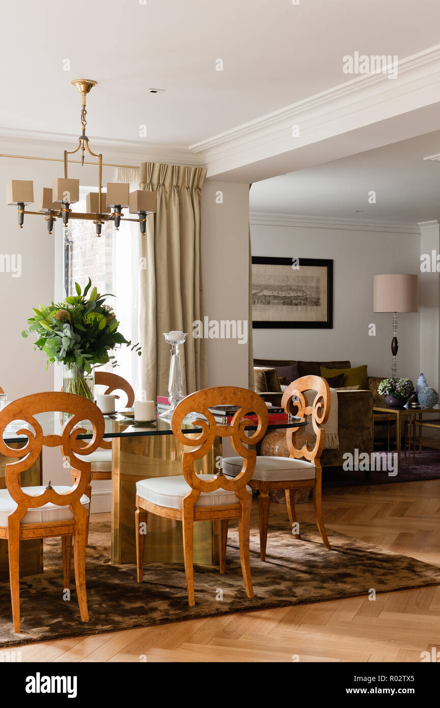 Dining room with wooden chairs Stock Photo Alamy