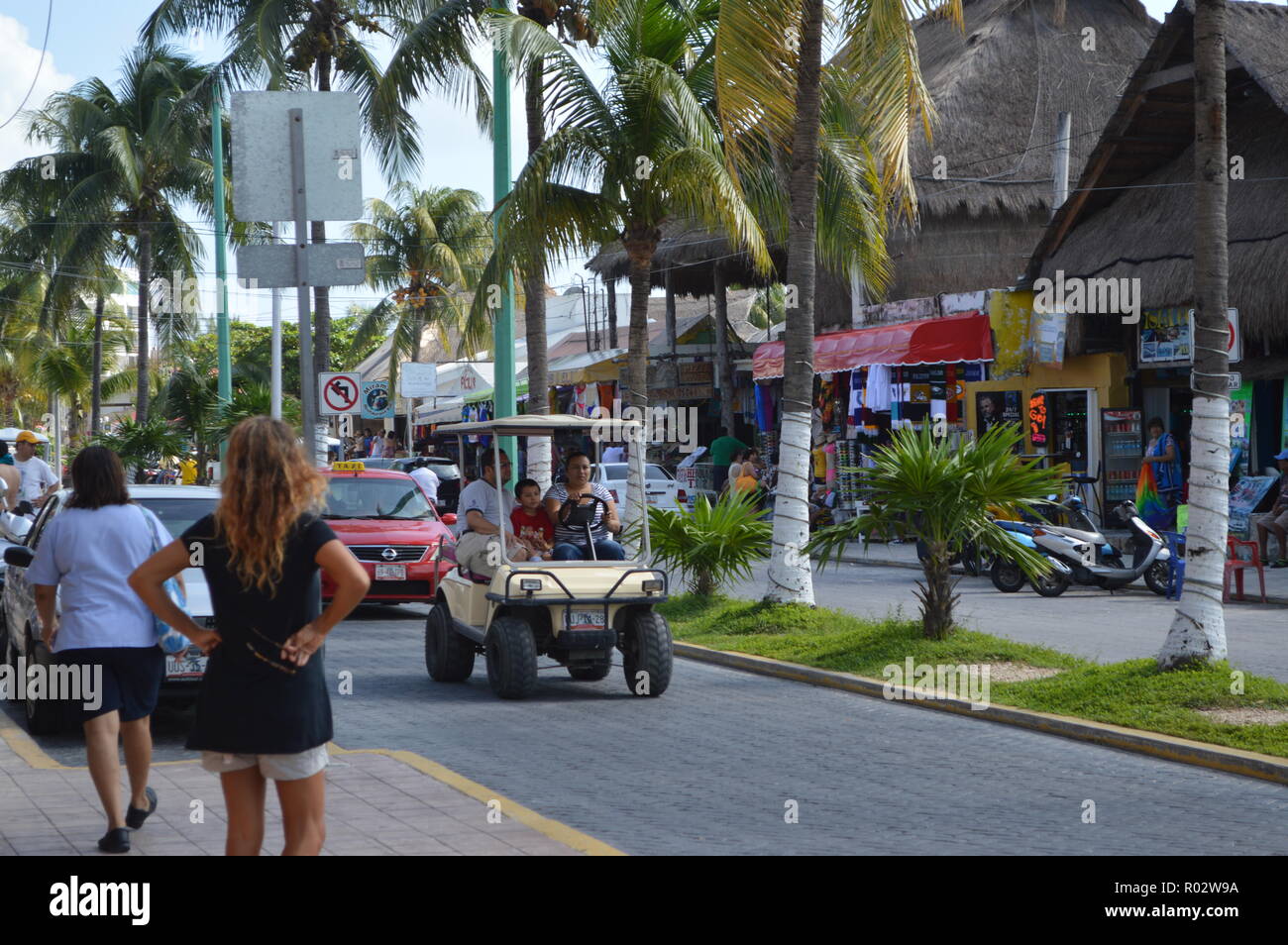Walk through the streets of Islas Mujeres in a golf cart. Stock Photo