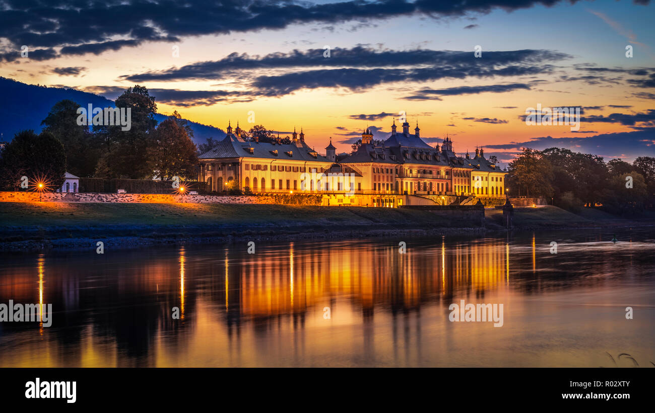 Pillnitz Castle , Riverside Palace at the Elbe river at sunrise, Dresden, Germany | Schloss Pillnitz, Dresden, Wasserpalais an der Elbe, Sonnenaufgang Stock Photo