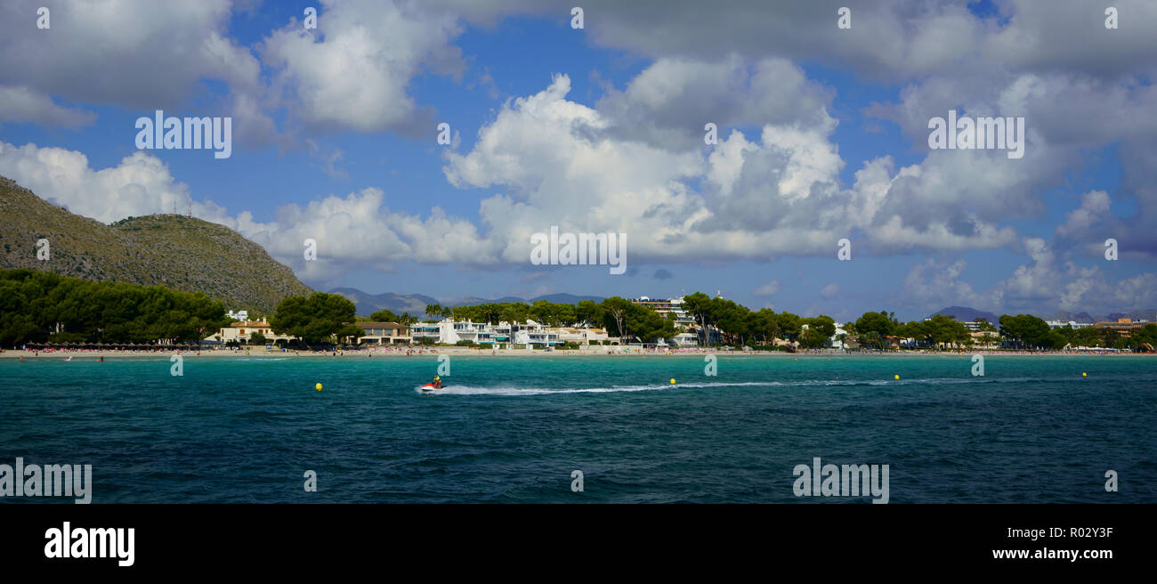 PLATJA DE MURO, ALCÚDIA, MAJORCA, SPAIN - OCTOBER 5, 2018: Beach life and water sports in northern Mallorca. Stock Photo