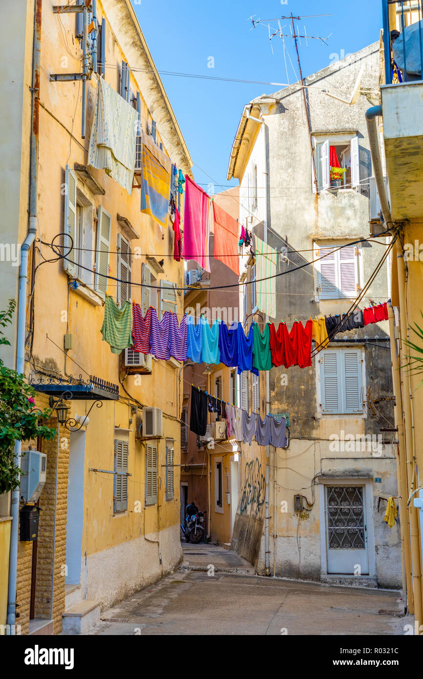 View of typical narrow street of an old town of Corfu, Greece Stock Photo