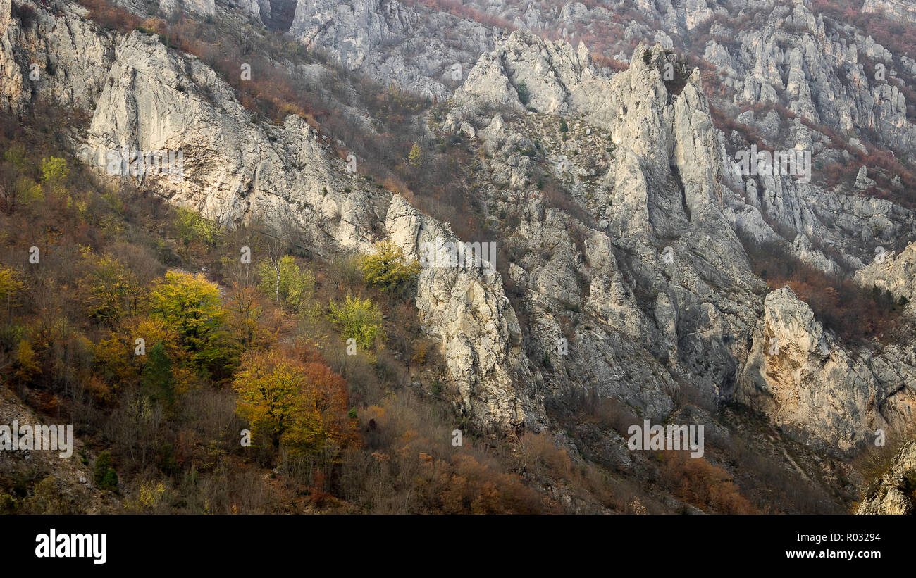 Pointy Rocks At Cliffs Rocky cliff, pointy rocks and autumn colored trees of canyon of Jerma ...
