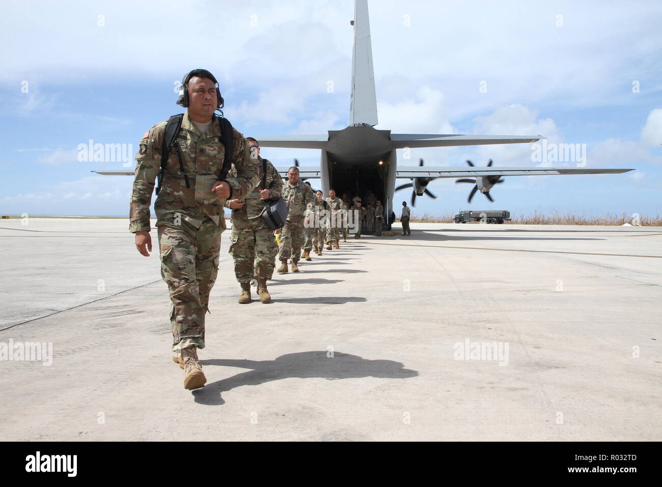 saipan-commonwealth-of-the-northern-mariana-islands-guam-based-soldiers-with-the-9th-mission-support-command-us-army-reserve-and-the-guam-army-national-guard-make-their-way-out-of-a-us-air-force-c-130-at-the-francisco-c-ada-international-airport-nov-1-recovery-efforts-continue-throughout-the-mariana-islands-in-response-to-super-typhoon-yutu-which-left-thousands-of-residents-without-electricity-or-running-water-service-members-from-joint-region-marianas-and-indo-pacific-command-are-providing-department-of-defense-support-to-the-commonwealth-of-the-northern-mariana-islands-civil-R032TD.jpg