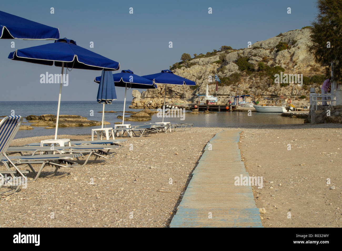 The beach leading to the boat jetty at Kolymbia, Rhodes,Greece, Stock Photo