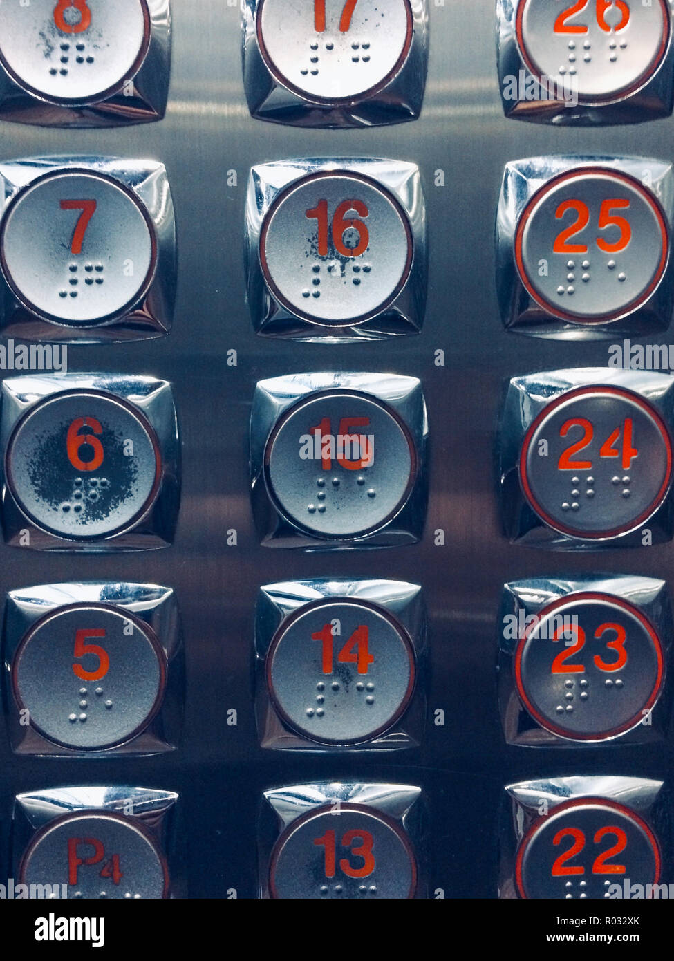 elevator buttons -  red numbers on metal buttons Stock Photo