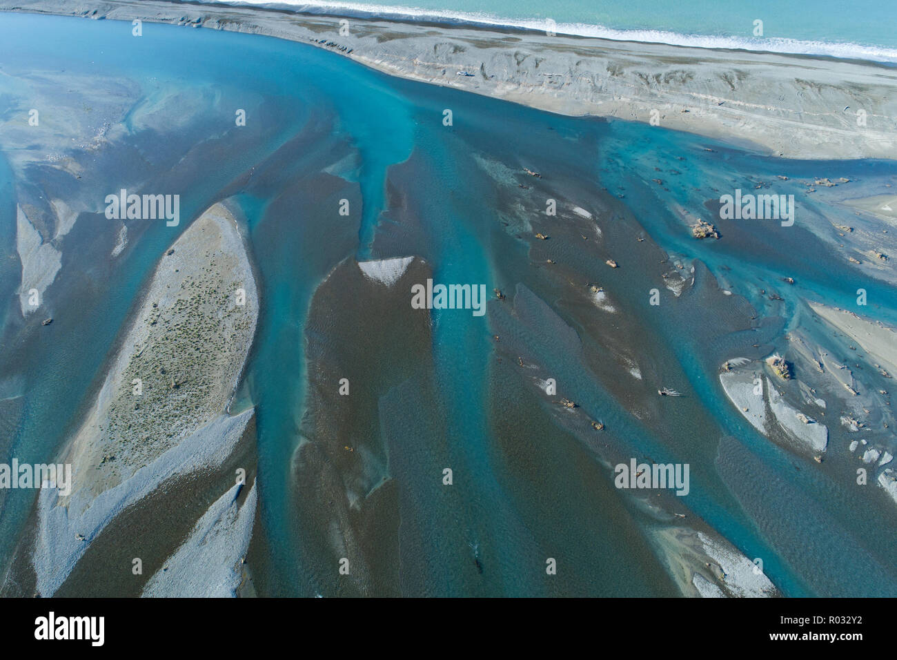 Braids of Rakaia River, near Rakaia River Mouth, Mid Canterbury, South Island, New Zealand - aerial Stock Photo