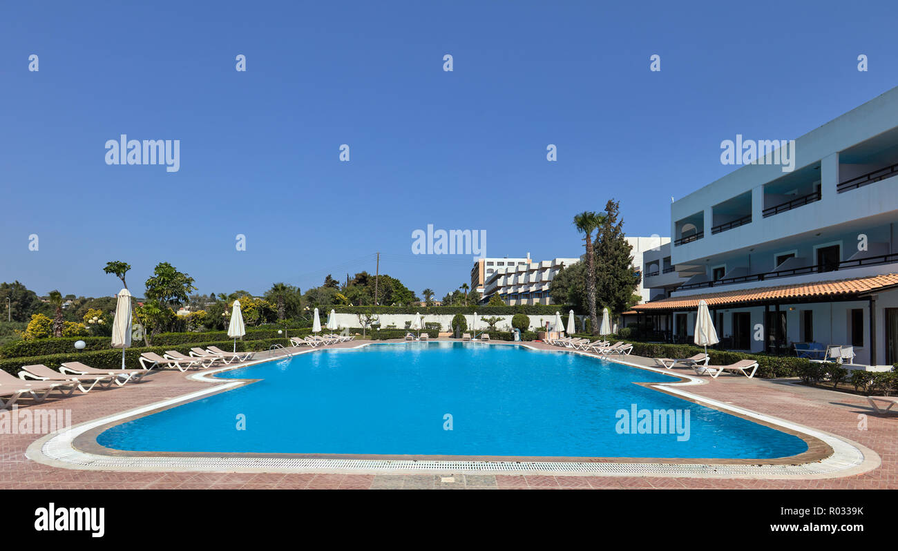 Swimming pool just outside hotel rooms in Aldemar Amilia Mare & Paradise Village, Kalithea, Rhodos, Greece Stock Photo