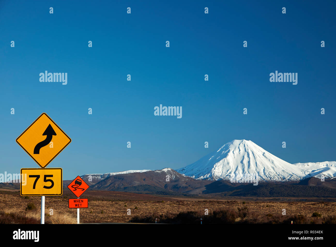 Road signs on Desert Road and Mt Ngauruhoe, Tongariro National Park, Central Plateau, North Island, New Zealand Stock Photo