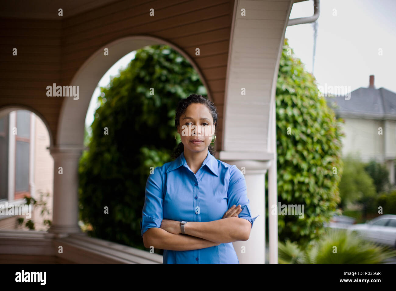 Woman in a blue shirt hi-res stock photography and images - Alamy