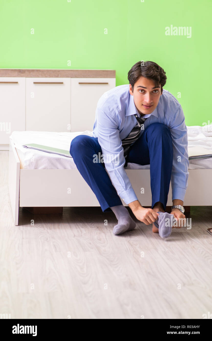 Young businessman employee late for office Stock Photo